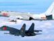 Bombardero H-6K y caza J-11chinos